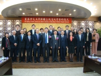 CUHK delegation signs collaboration agreement with Taiwan Cheng Chi University. They also meet its President Prof. Wu Se-Hwa (front row, 4th from right)